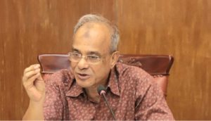 Home Adviser Lt Gen. (Retd.) Md Jahangir Alam Chowdhury gesturing with his hand while speaking into a microphone at a press briefing.